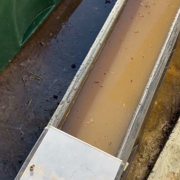 The control unit at the inlet end of the trough